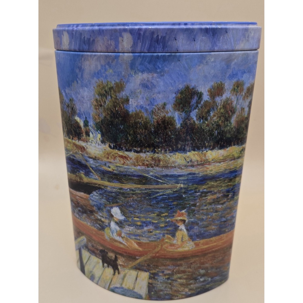 Cylindrical Tin Featuring A Reproduction Of A Painting Of Monet Collectable